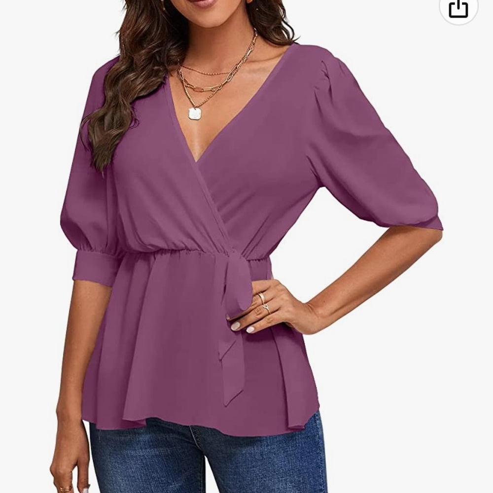 Brand new without tags tunic top.  Size XXL.  Beautiful purple top